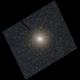 A bright spot marks a concentration of stars in the Andromeda Galaxy, in a rectangular image by Hubble.